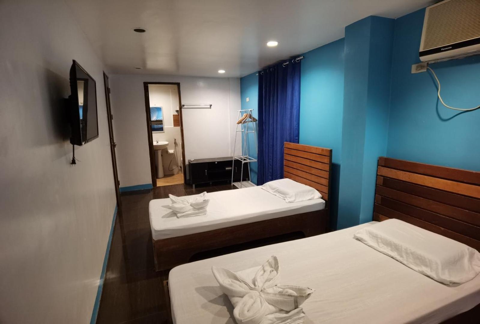 Amos Pili Tree Inn Powered By Cocotel เอลนิโด ห้อง รูปภาพ