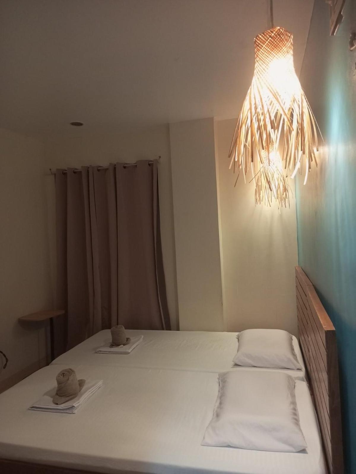Amos Pili Tree Inn Powered By Cocotel เอลนิโด ภายนอก รูปภาพ